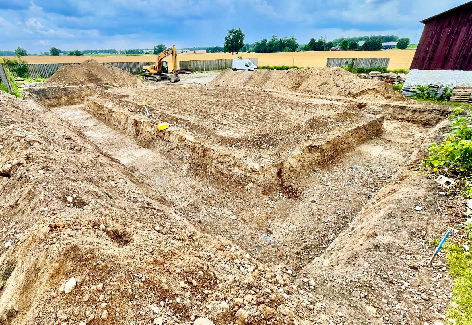 Excavator with complete house foundation and backfill project in Guelph, Ontario
